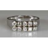 Ring, WG 585, 10 Brillanten zus. ca. 0.60 ct., etwa w/si-p1, Goldgewicht 4.6 g, RM 17- - -25.00 %