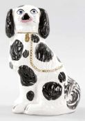 KaminhundKeramik, wohl Staffordshire, 20.Jh. Stilisierter Cavalier King Charles Spaniel in Bicolor-