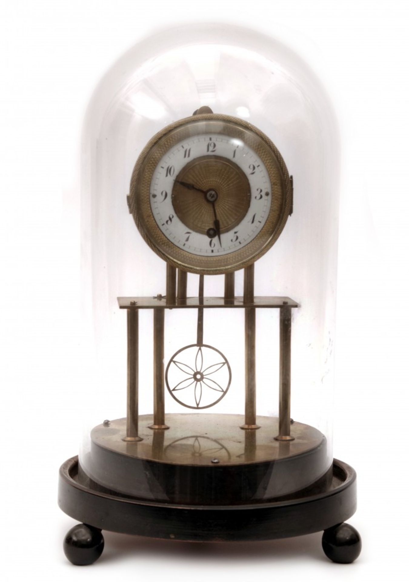 A Small Table Clock with Glass Dome
