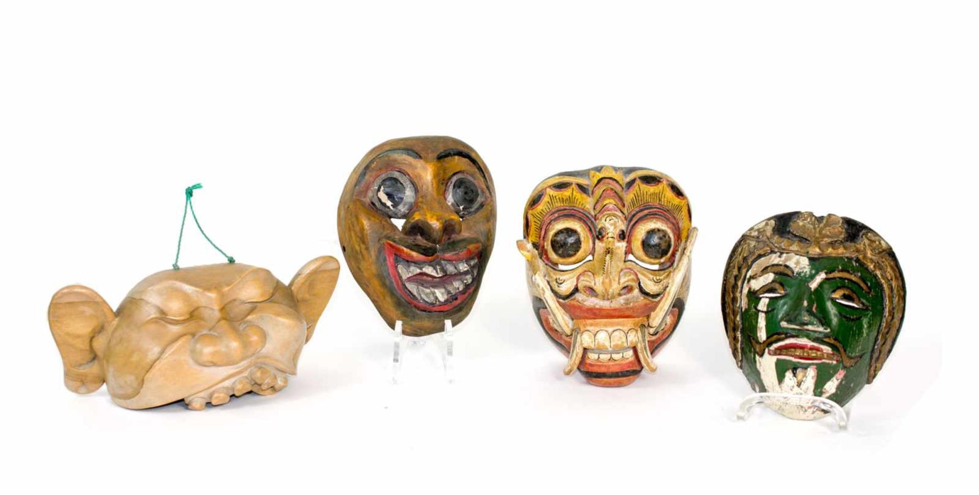 Asiatische Masken4-tlg., u.a. Rangda-Maske aus Bali, Hanuman-Maske und Ceylon-Gesundheitsmaske aus