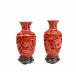 Paar Vasen2-tlg., China, um 1900, Holz, geschnitzt, Rotlack, innen blau staffiert, auf Holzsockel,
