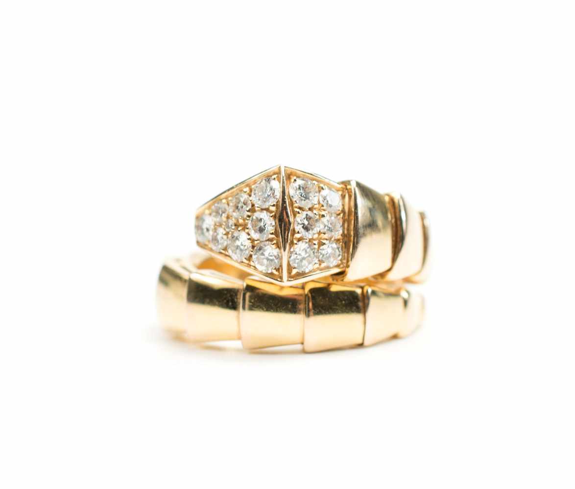 Ladies Ring Bulgari, 750 red gold, with 15 brilliants, total approx. 0.409 ct, vvs, G, ring diameter