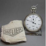 STOPPUHR / stopwatch, Schweiz, Firma Heuer, Mitte 20. Jh., Edelstahlgehäuse mit Krone. Weißes