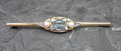 STABBROSCHE / brooch, 585er Gelbgoldfassung (6,5 g), besetzt mit einem Aquamarin im Kissenschliff,