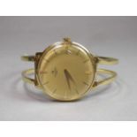 GOLDENE ARMBANDUHR "Ducado Swiss" / wristwatch, in 750er Gelbgoldgehäuse (gestempelt 18 k) und einem