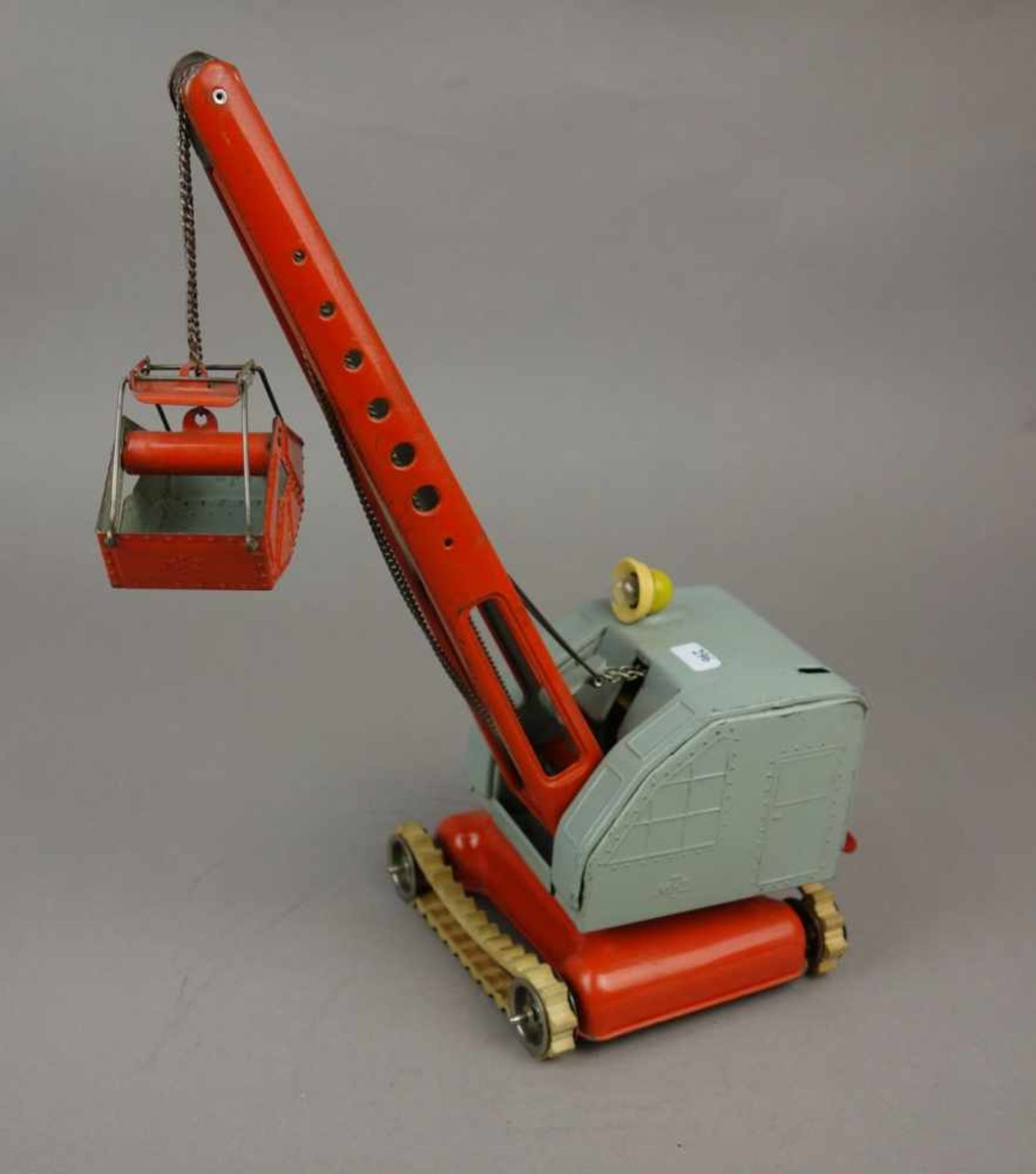 BLECHSPIELZEUG: RAUPENBAGGER / toy crane crawler excavator, 20. Jh., Manufaktur MFZ - Martin