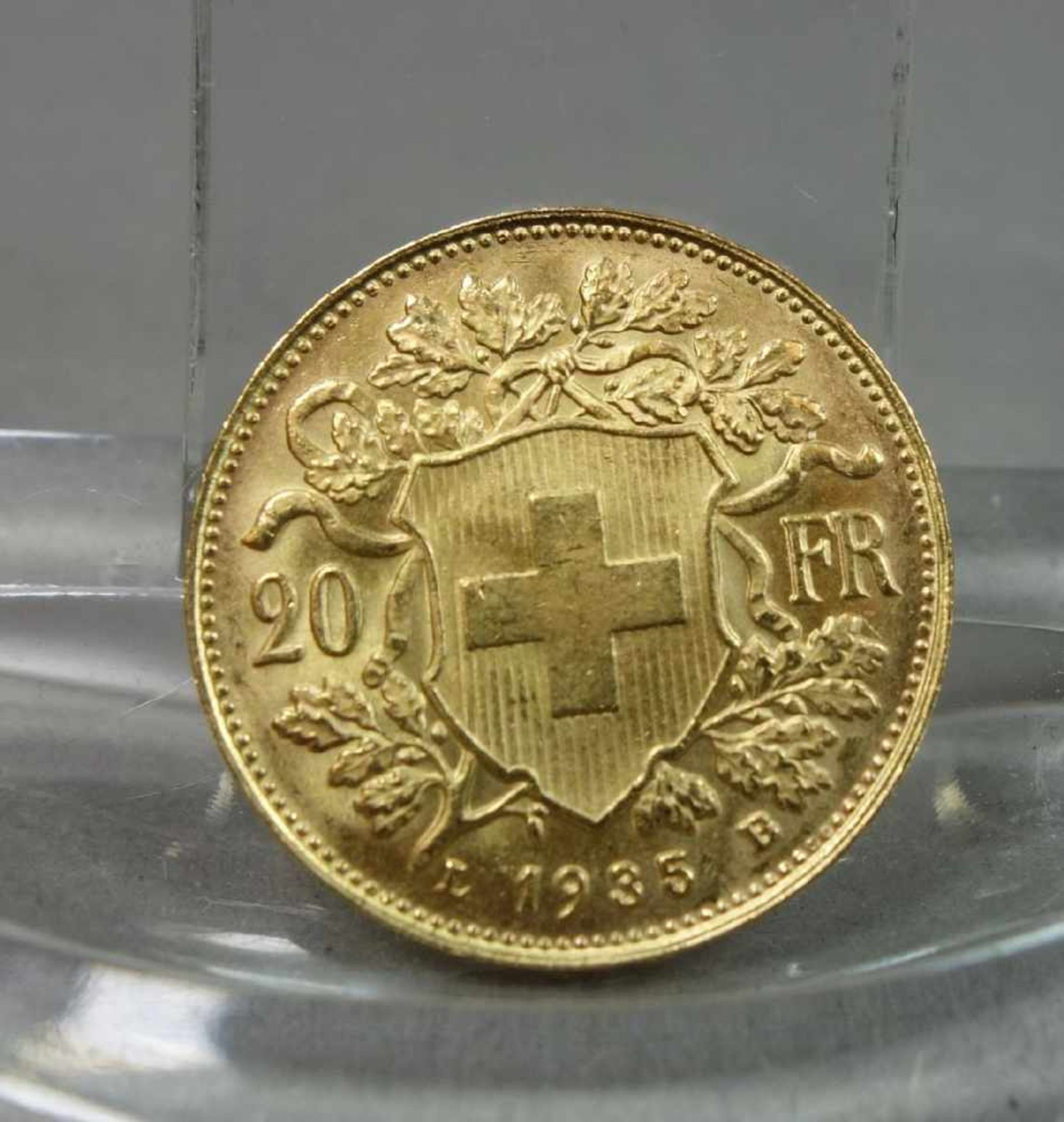 GOLDMÜNZE: 20 FRANKEN / gold coin, Schweiz, 1935, 6,4 Gramm, 900er Gold. Avers: Wappenschild der