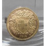 GOLDMÜNZE: 20 FRANKEN / gold coin, Schweiz, 1915, 6,4 Gramm, 900er Gold. Avers: Wappenschild der