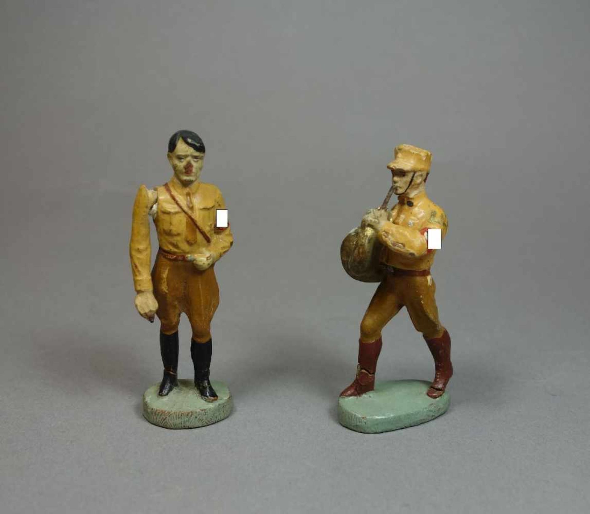 HISTORISCHE SPIELFIGUREN / SPIELZEUG-FIGUREN: HITLER und SOLDAT, 1. H. 20. Jh. / "Drittes Reich",