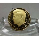 GOLDMÜNZE: JOHN F. KENNEDY / gold coin, 10,5 Gramm, 900er Gold. Münze mit Profil des Präsidenten und