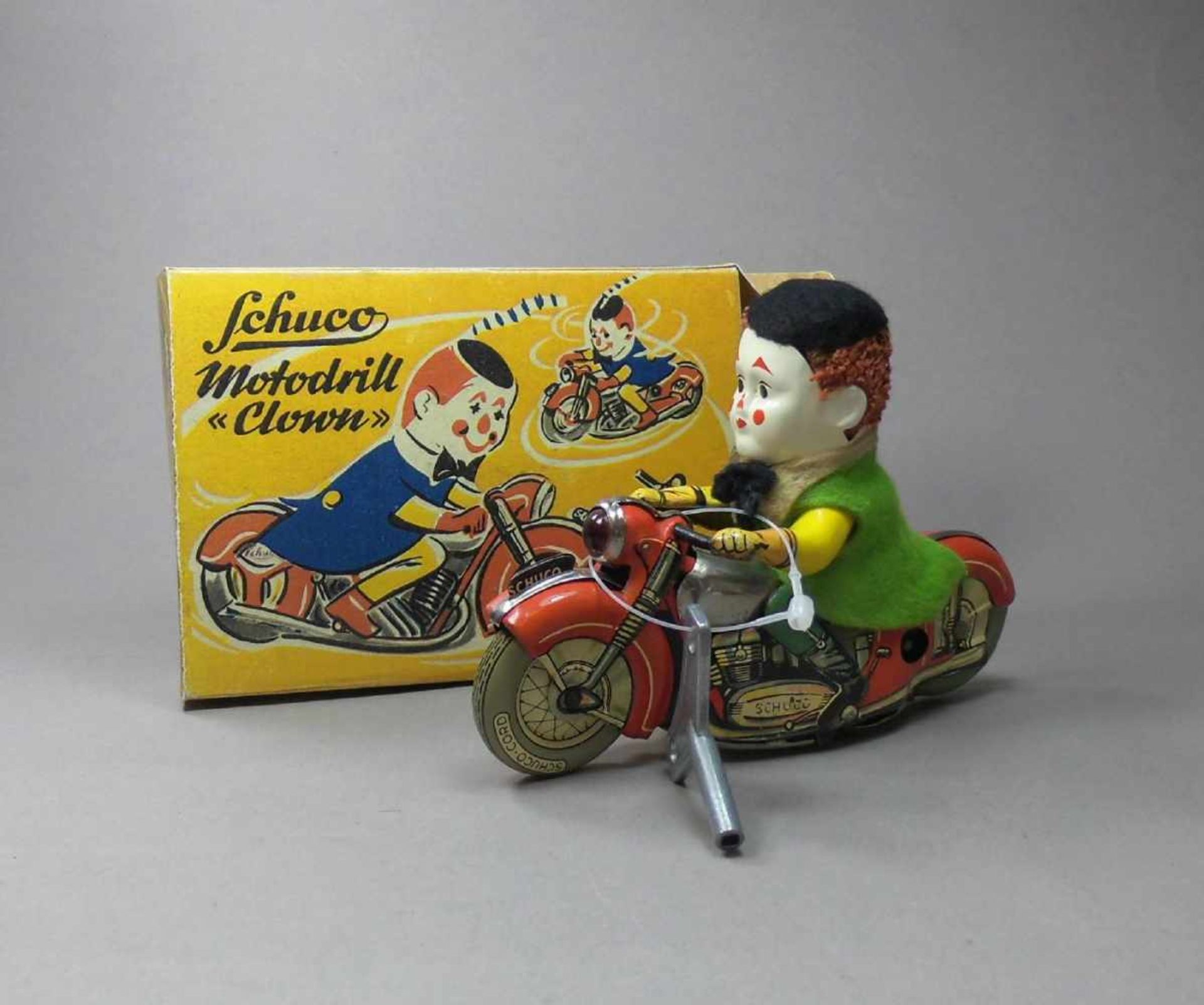 SPIELZEUG / BLECHSPIELZEUG: Motodrill "Clown" / tin toy clown, 1950er Jahre, Manufaktur Schuco /
