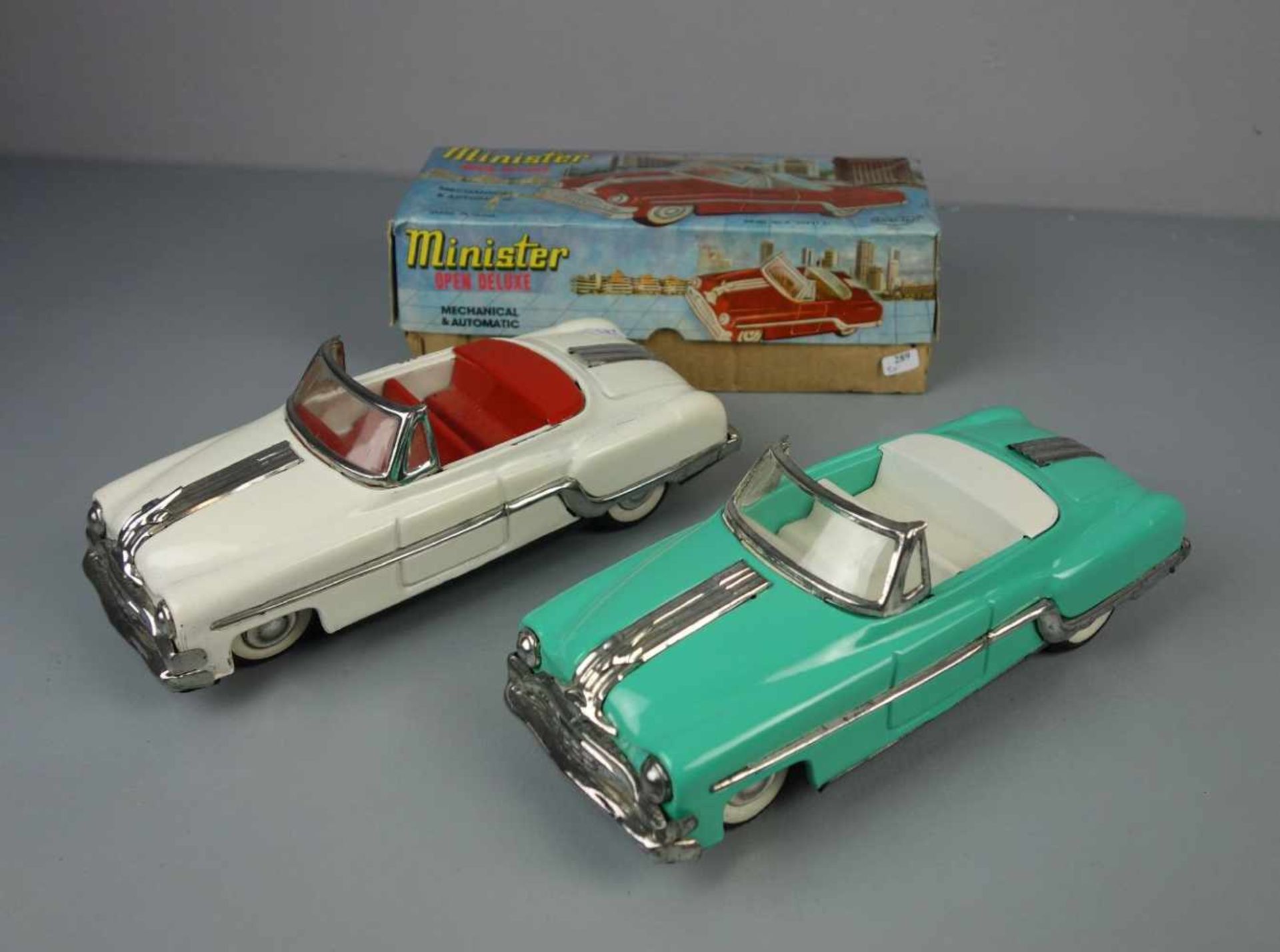 BLECHSPIELZEUG / FAHRZEUGE: 2 AUTOS - MINISTER - OPEN DELUXE / two tin toy cars, Mitte 20. Jh.,
