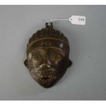 BRONZE - MASKE, Afrika, wohl Benin / Westafrika. Aufgewölbte Maske mit stilisierter männlicher