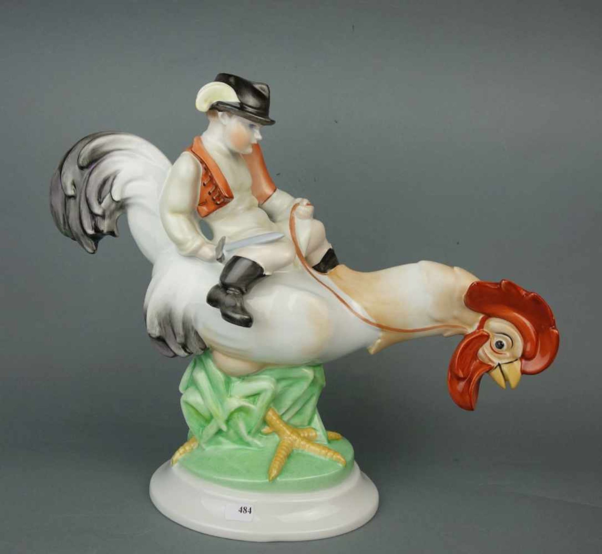 PORZELLANFIGUR / porcelain figure: "Hahnreiter", Manufaktur Herend / Ungarn, Modellnummer 5457.