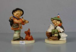 PAAR HUMMELFIGUREN / two porcelain figures, 20. Jh., Porzellan, polychrom staffiert. 1) "