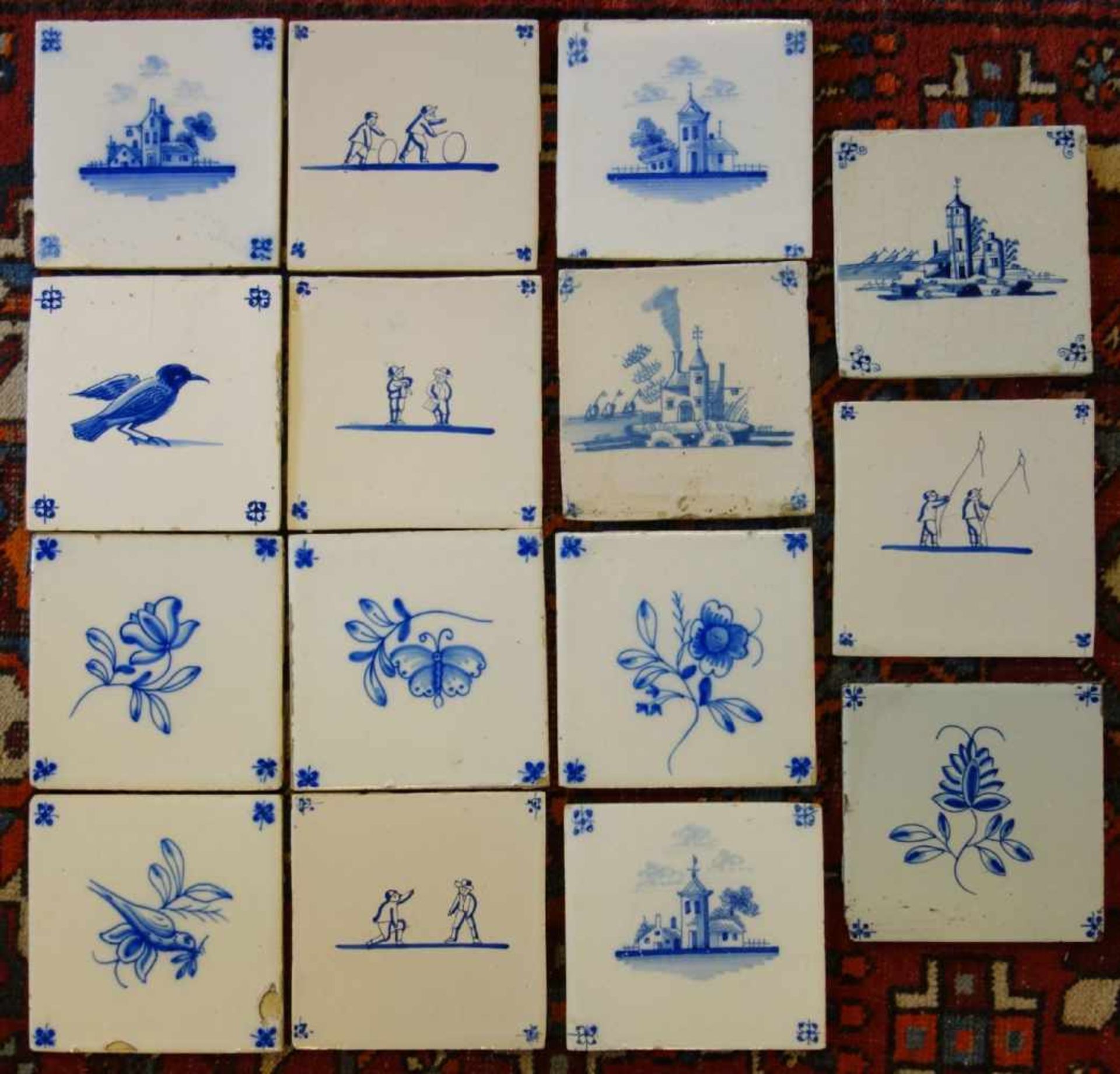 KONVOLUT VON 15 HOLLÄNDISCHEN FLIESEN / sog. DELFTER FLIESEN / DELFTER KACHELN / delft tiles, 19.