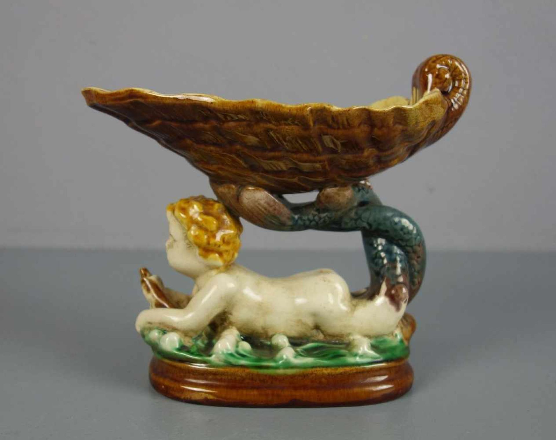 FIGÜRLICHE SALIERE / SCHALE / figures bowl: "Knabe in Form eines Meermannes", Italien, Majolika,