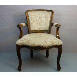 LOUIS PHILIPPE - ARMLEHNSESSEL / armchair, Nussbaum, Mitte 20. Jh.; geschweifter trapezförmiger Sitz