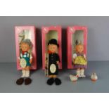 DREI PUPPEN / 3 dolls, 20. Jh.. Insgesamt drei Engel-Puppen in Lizenz M. J. Hummel. 1) Peterle,