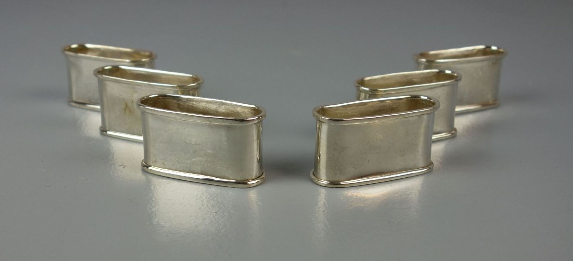 6 SERVIETTENRINGE / silver napkin rings, 925er Silber (insgesamt 124 g), ovale Form mit profilierten