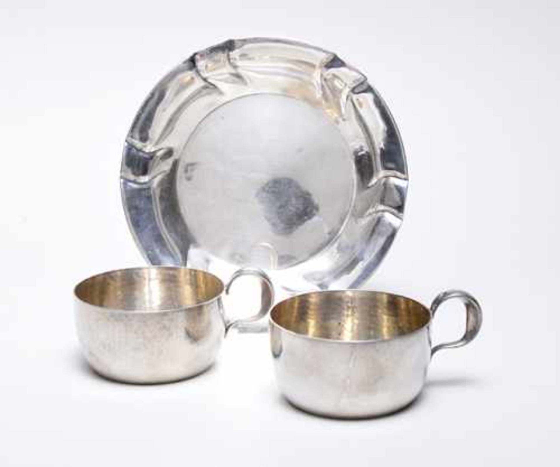 3 Teile Silber; best. aus a) 2 Teeglashalter "Wilkens"; Silber 835; D = ca. 7,6 cm; g (gesamt) =