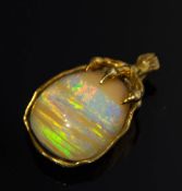 CABOCHON ANHÄNGER, 18k Gold mit Opal, 20. Jh.18k Gold Anhänger mit Cabochon Karamell Opal wohl