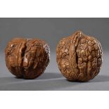 2 Diverse beschnitzte Walnüsse "100 Arhats", um 1900, H. 4,5/4cm2 Various carved walnuts ''100