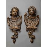 Paar geschnitzte Eichen Reliefs "Engelsköpfe", 18./19.Jh., H. 65cm, rest.Pair of carved oak