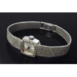 WG 585 AMANN Damenarmbanduhr mit Quarzwerk, Diamantlunette (zus. ca. 0.10ct), 25g, L. 18,5cmWG 585