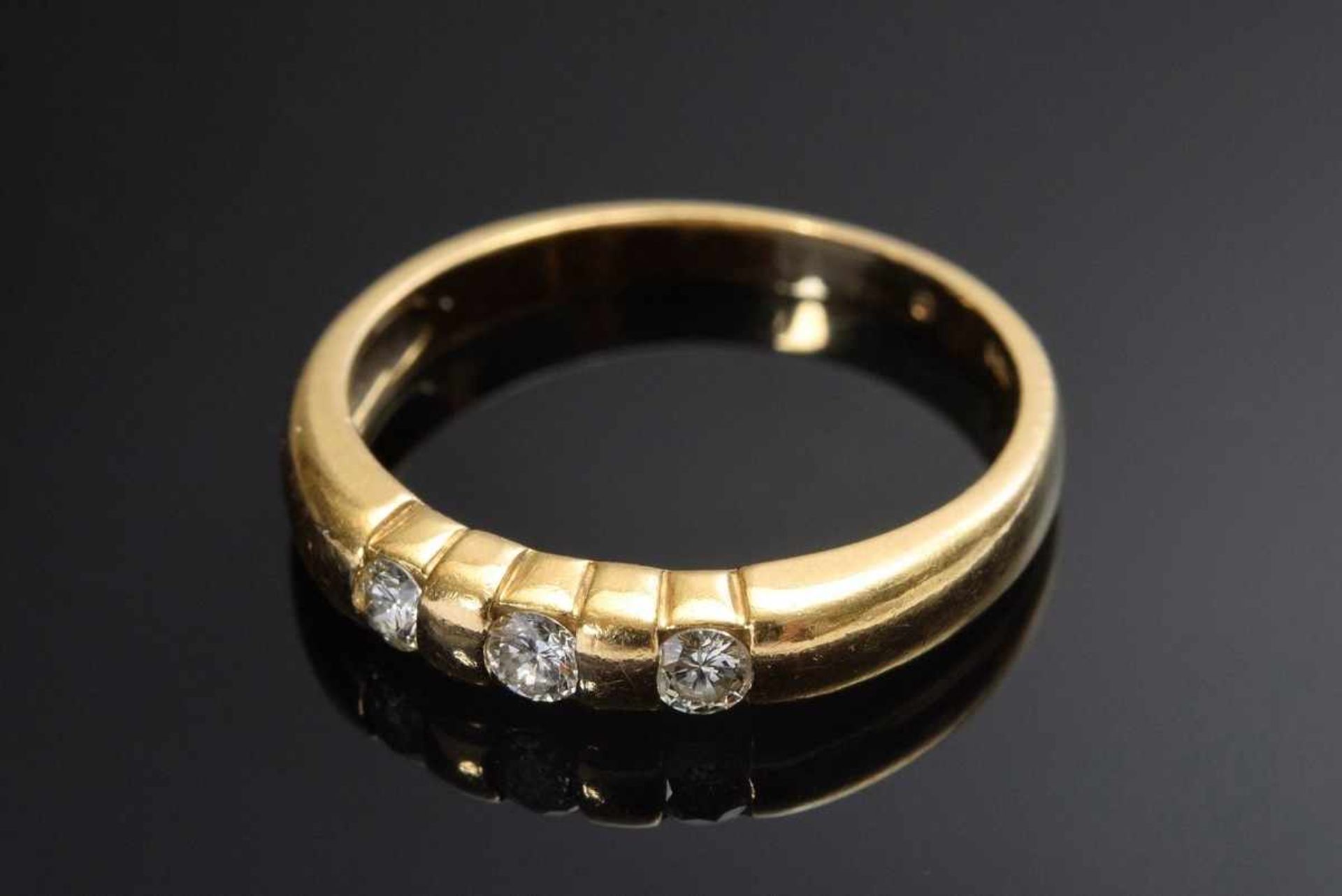 Zeitloser GG 750 Ring mit 3 Brillanten (zus.ca. 0.18ct/SI/W), 3,5g, Gr. 56 Timeless GG 750 ring with