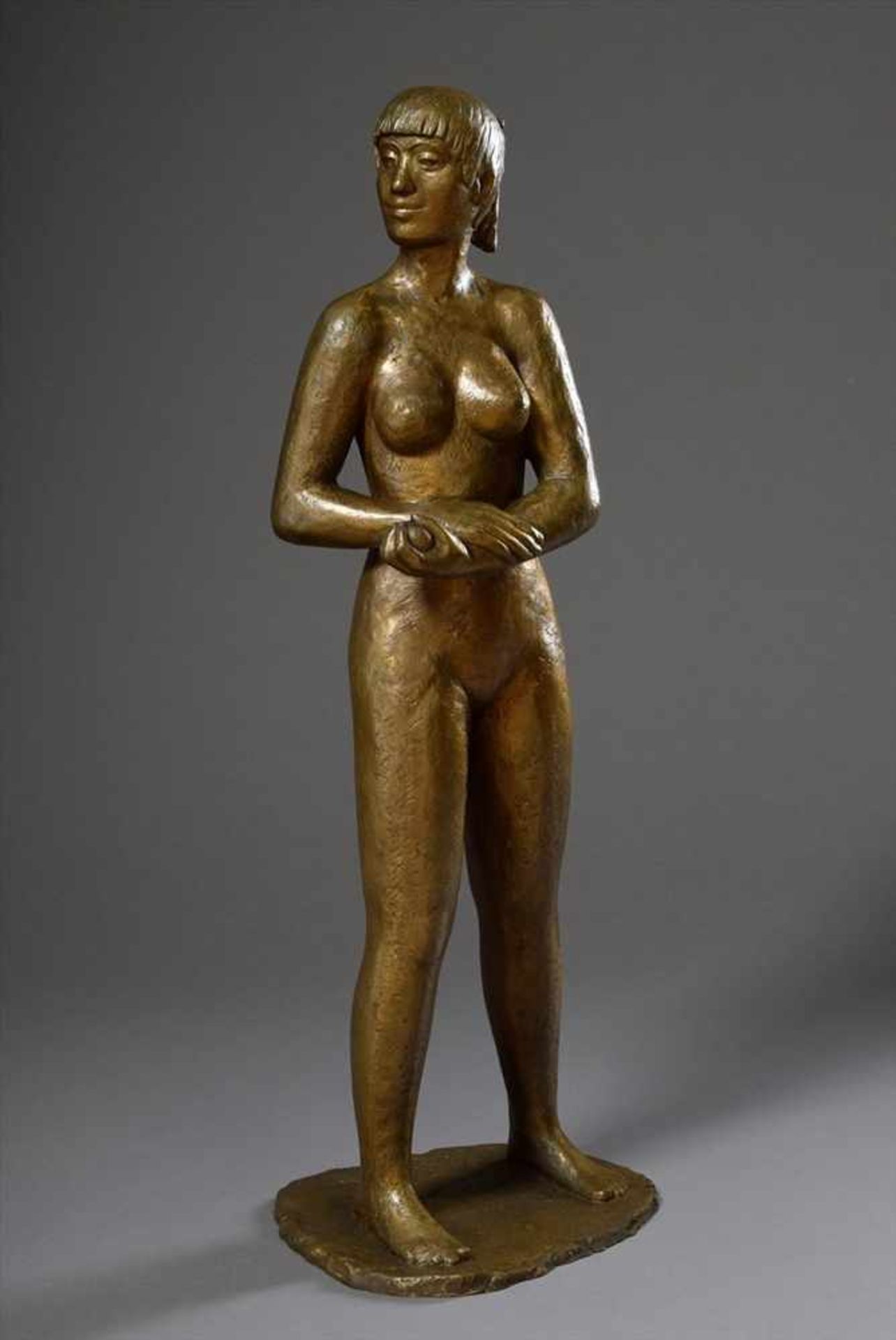 Riesen, Adolf (1908-1982) "Stehende mit Apfel", Bronze patiniert, Plinthe sign., H. 89cmRiesen,