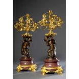 Paar französische Girlandolen auf Marmorbasis mit brünierten Bronzen in feinster Qualität "Putti auf