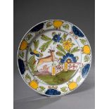 Fayence Teller "Springender Hirsch in Landschaft", polychrom bemalt, gemarkt "G.B.S.", Ø 34cm,