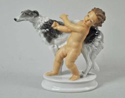 PUTTO MIT WINDHUND "Windspiel", Putto einen Windhund am Halsband haltend, fein polychrom