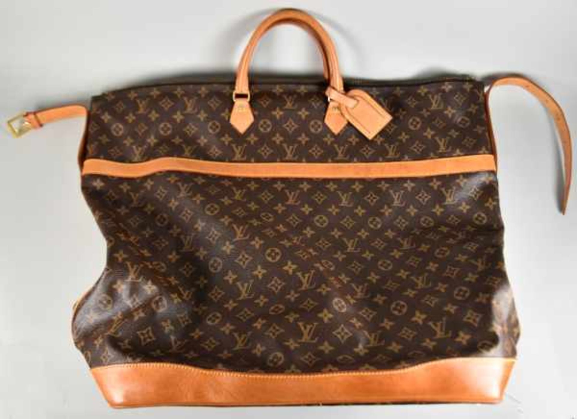 CRUISER BAG 55/REISETASCHE Louis Vuitton, Monogram Canvas, zwei beige Ledergriffe u. seitliche