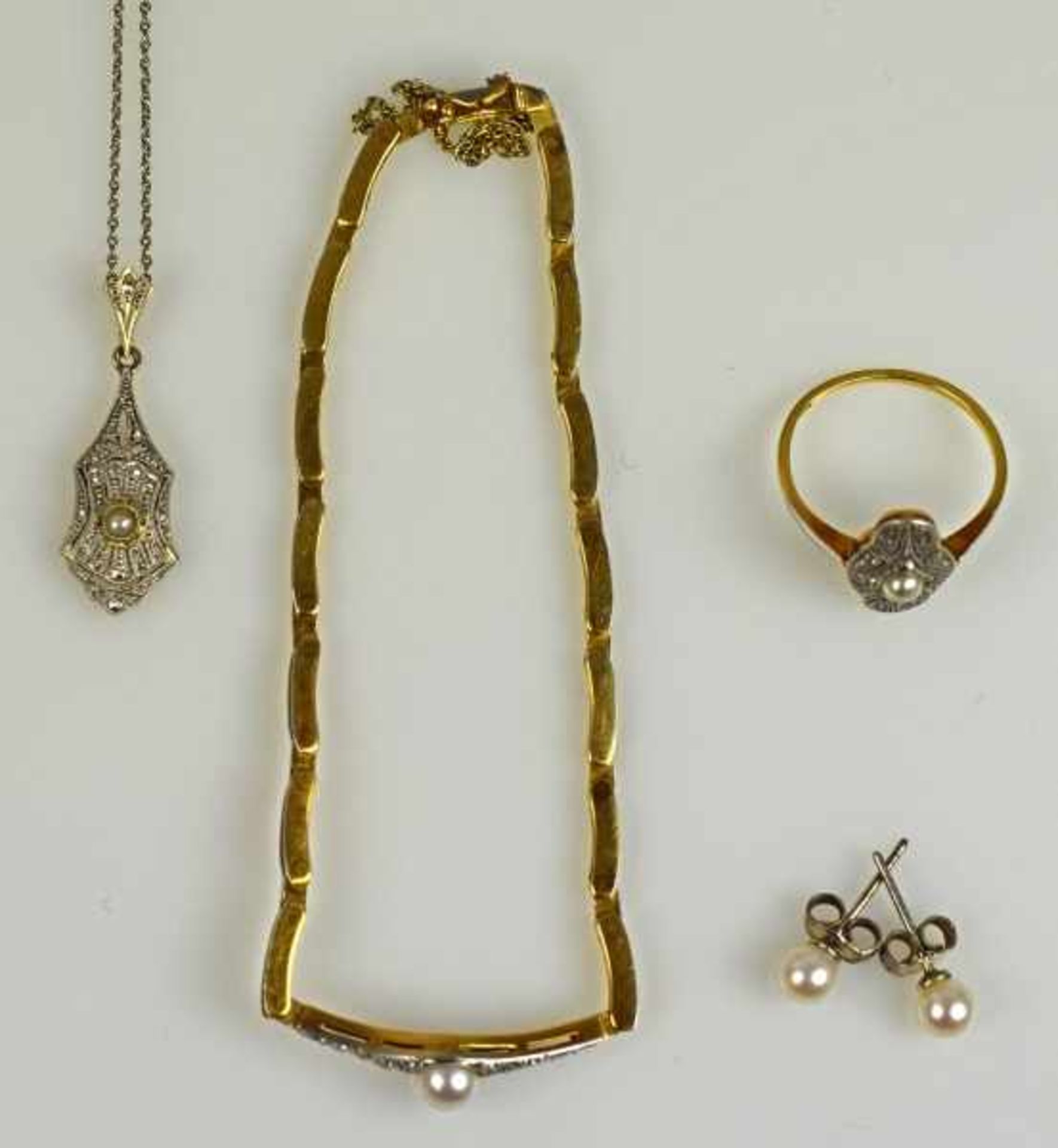 PARÜRE fünfteilig: Armband L 19cm, Kette mit Anhänger, L 41cm, und Ring Gr. 51, besetzt mit