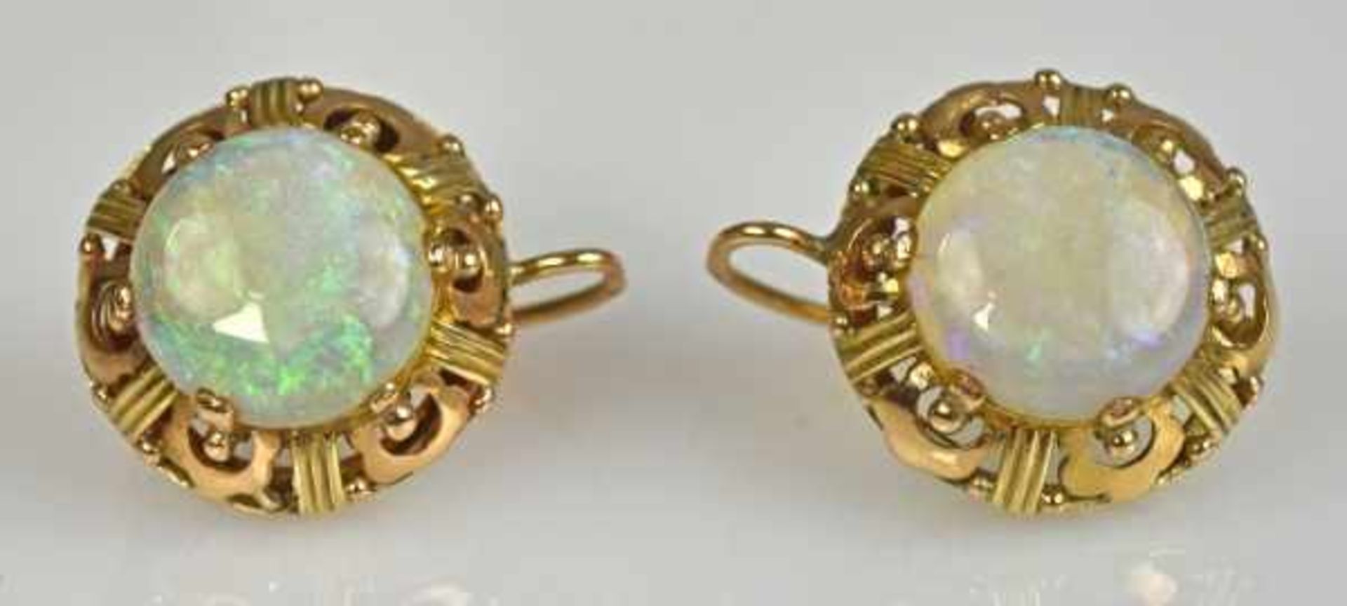 OPALRING runder Opal in durchbrochener Gelbgoldfassung 14ct, 5,48g, Gr. 56- - -23.00 % buyer's