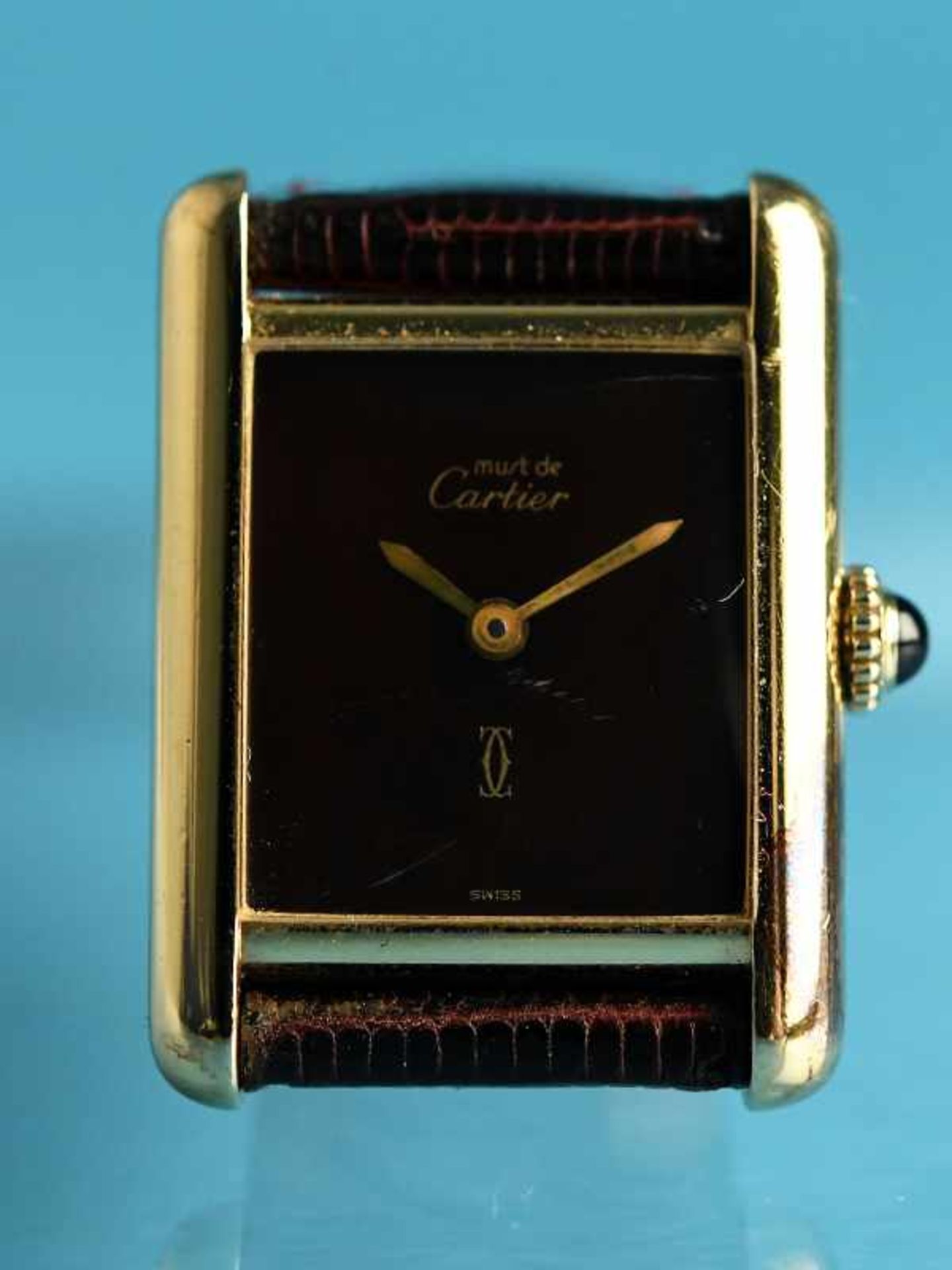 Damenarmbanduhr, bezeichnet Cartier, 20. Jh. 925/- Silber, vergoldet. Schlichtes Gehäuse mit