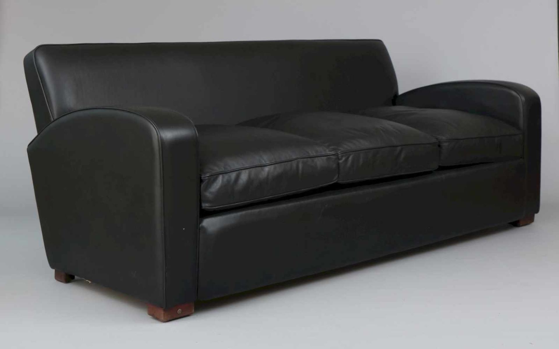 Ledersofa (3-Sitzer) im Stile des Art Deco schwarzes Kernleder, lose Sitzkissen, geschwungene