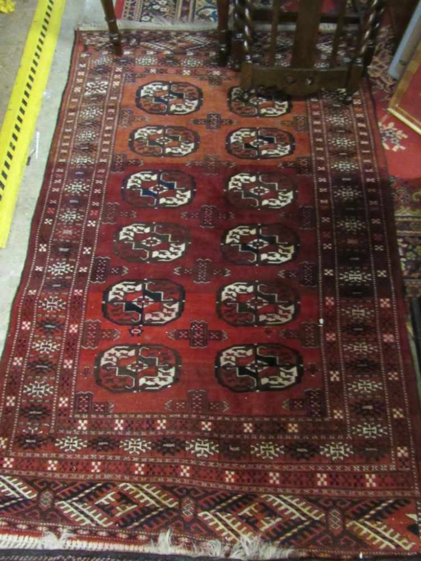 Teppich handgeknüpft rotgrundig ca.180x110cm