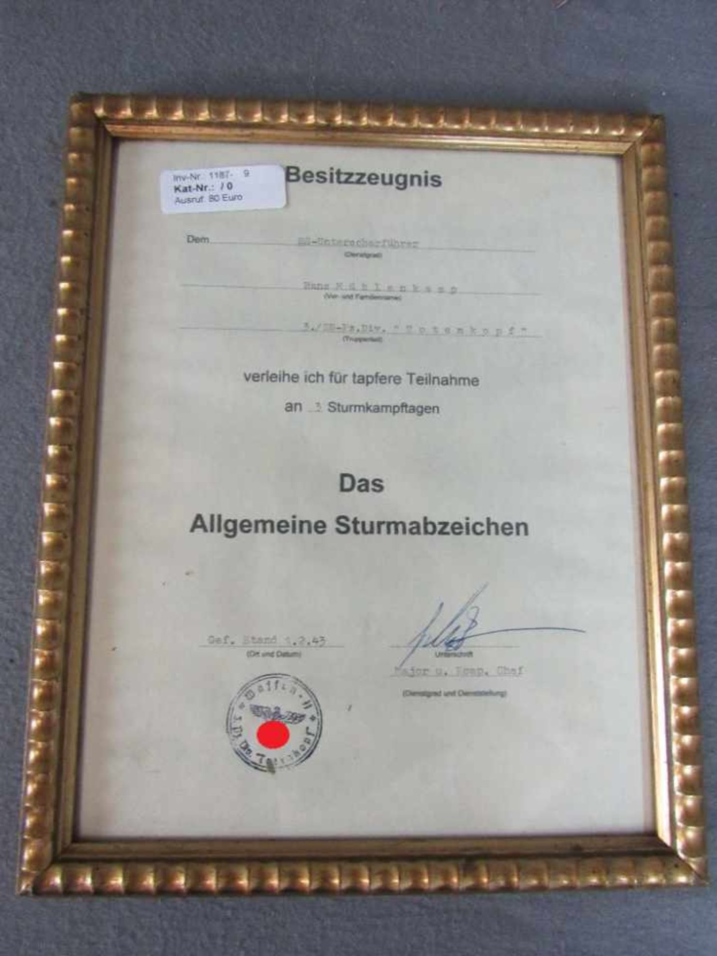 Besitzzeugnis für SS Unterscharfführer Totenkopf für allgemeine Sturmabzeichen im Rahmen
