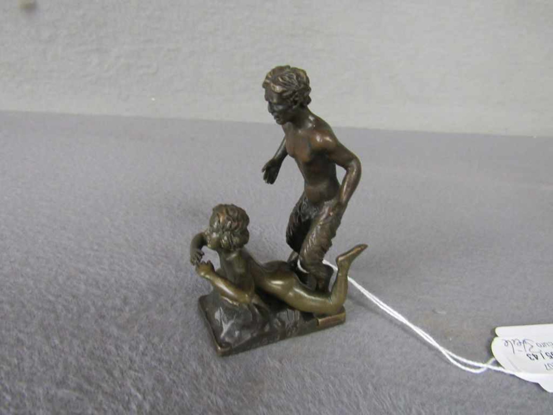 Miniatur Bronze Faun im Liebesakt dreiteilig evtl Wien- - -20.00 % buyer's premium on the hammer