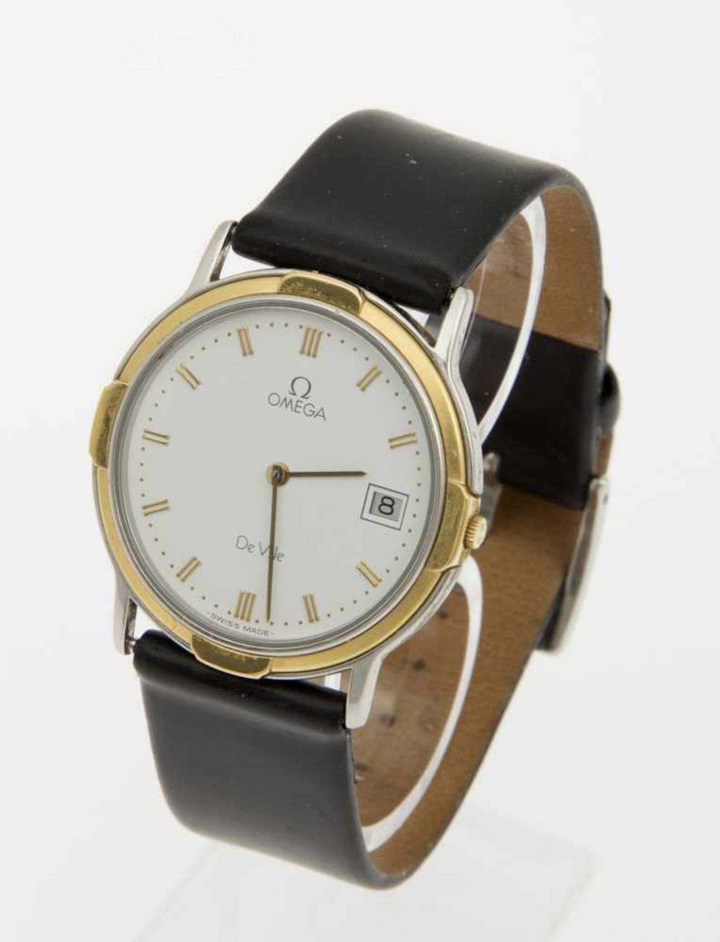 Omega-Armbanduhr De VilleFlaches Gehäuse aus Stahl, partiell vergoldet. Weißes Zifferblatt mit