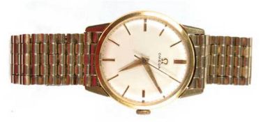 Armbanduhr "Omega", 585er GG und Edelstahl, stabförmige goldene Stundeneinteilung,Zenralsekunde,