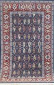 Hereke, Türkei, blau/rot grundig, mit zentralem Muster u. floralen Motiven, mit Gravur,175x102 cm