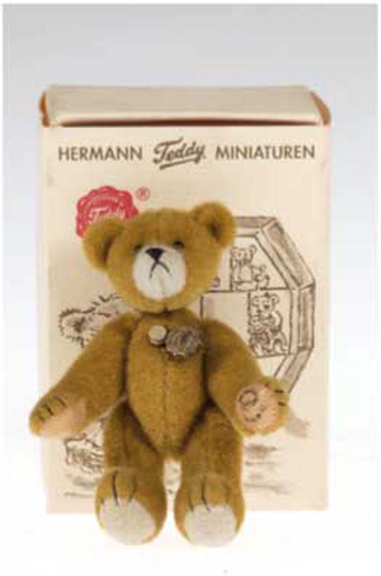 Teddy "Hermann", Miniatur, mit Original Teddy-Hermann-Siegel, Arme, Beine u. Kopfbeweglich, linke