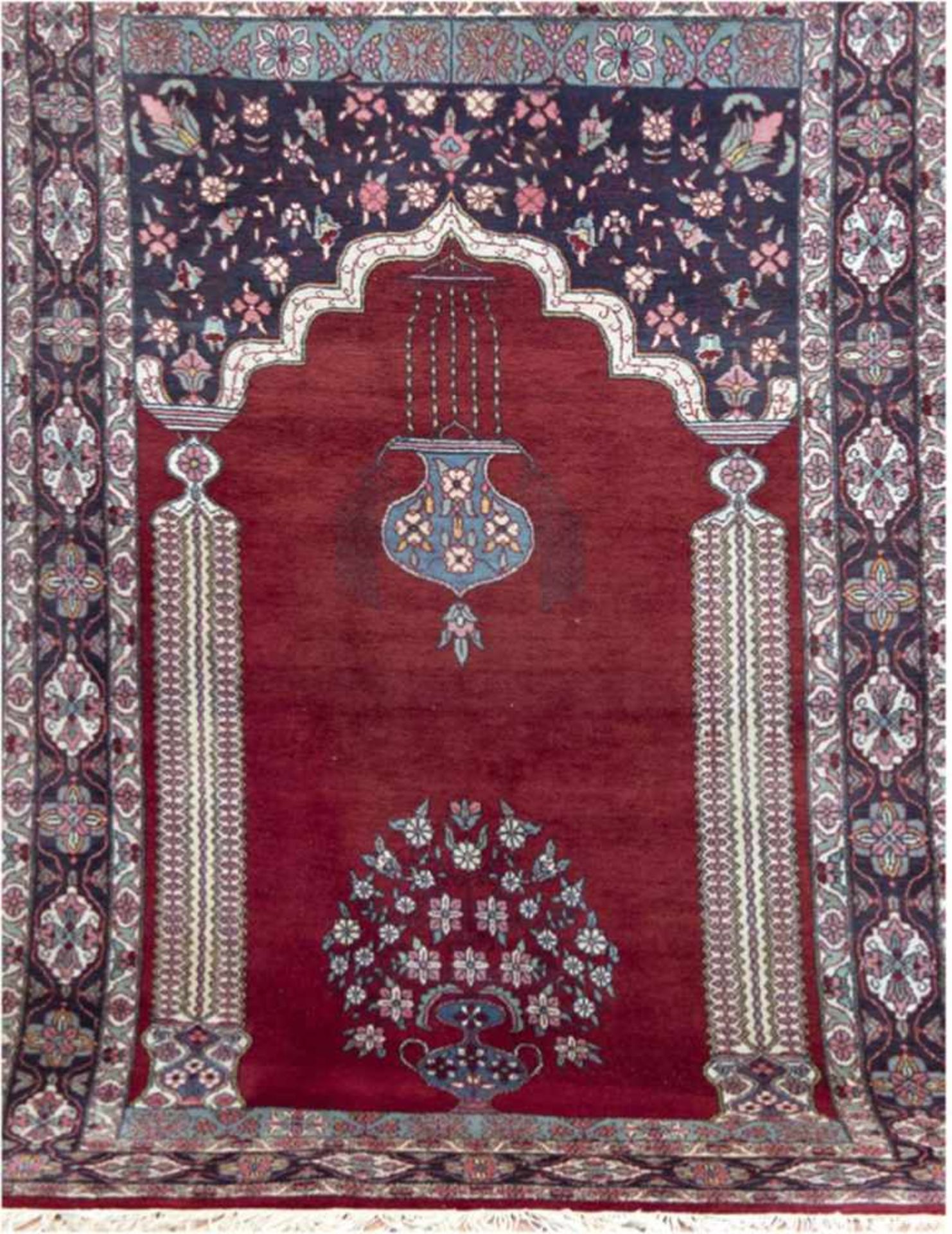 Rajasthan, Gebetsteppich, dunkelgrundig, mit zentralem Blumenbild, floralen Motiven,Fransen leicht