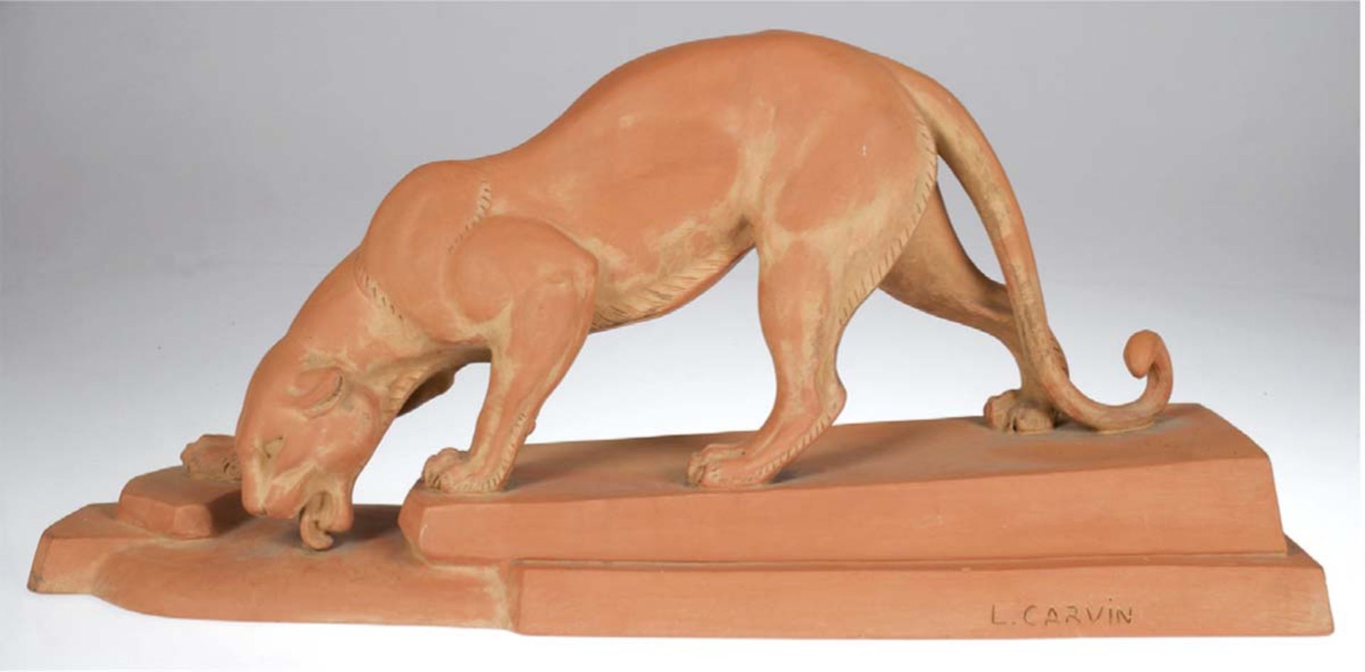 Carvin, Louis-Albert (1875-1951) "Trinkender Panther", rotbrauner Ton, auf dem Sockelsigniert "L.