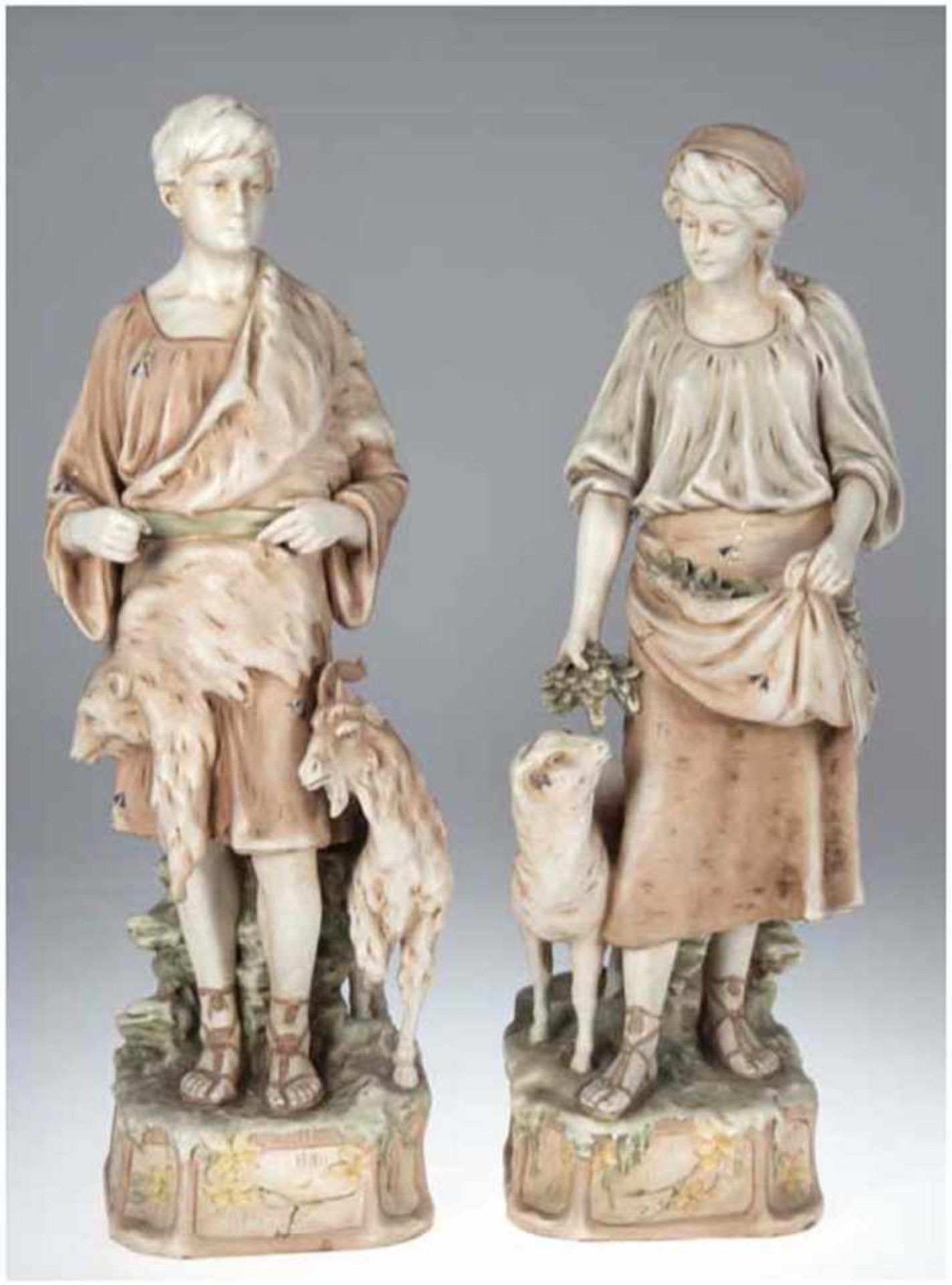 Paar Dux-Figuren "Ziegenhirte und Schafhirtin", Bohemia Porzellan, auf Sockel, Hirtenstabfehlt,