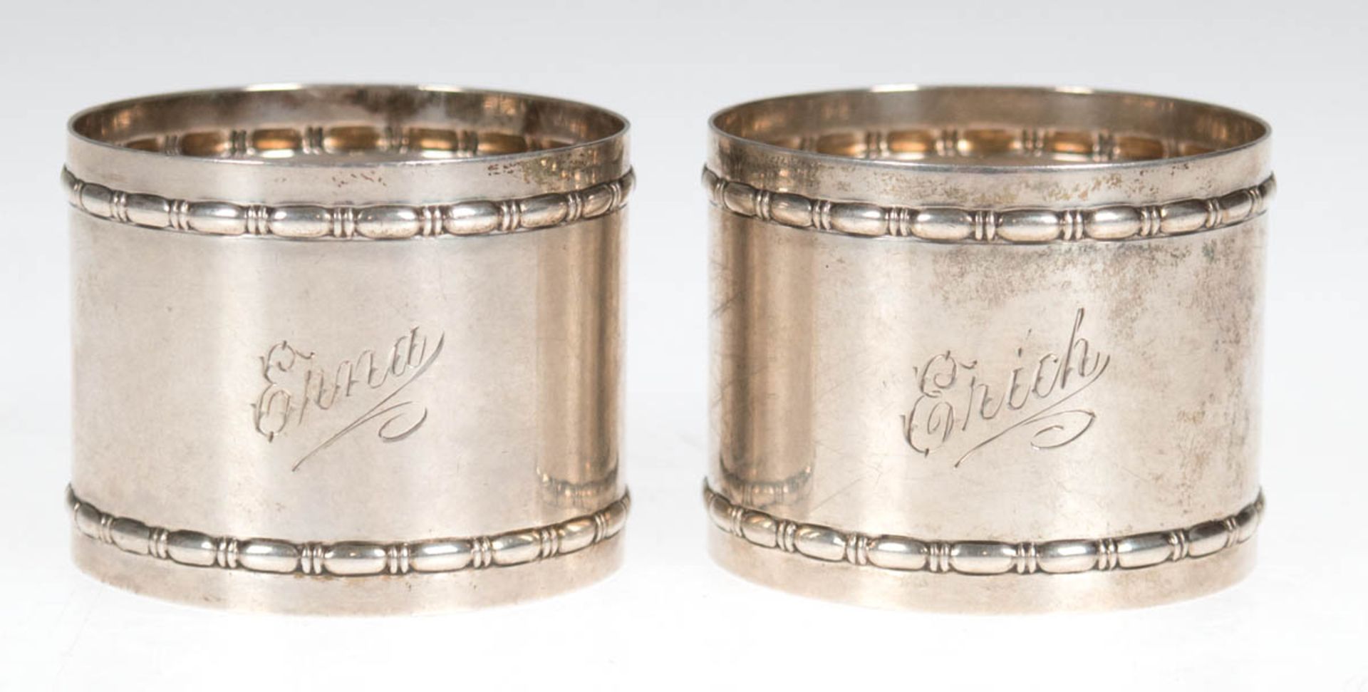 Paar Serviettenring, 800er Silber, mit Gravur "Erna" und "Erich", ca. 58 g